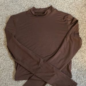 brown turtle neck top